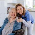 Woman and nurse smiling