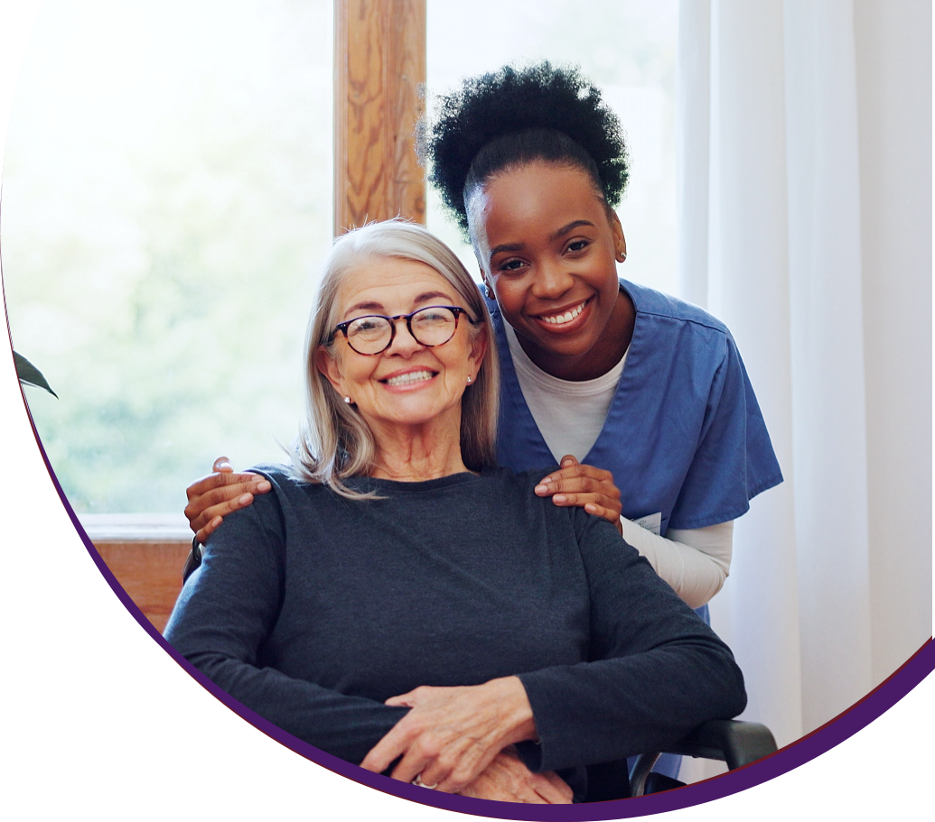 caregiver and senior smiling