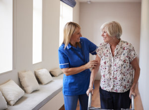 caregiver assisting senior