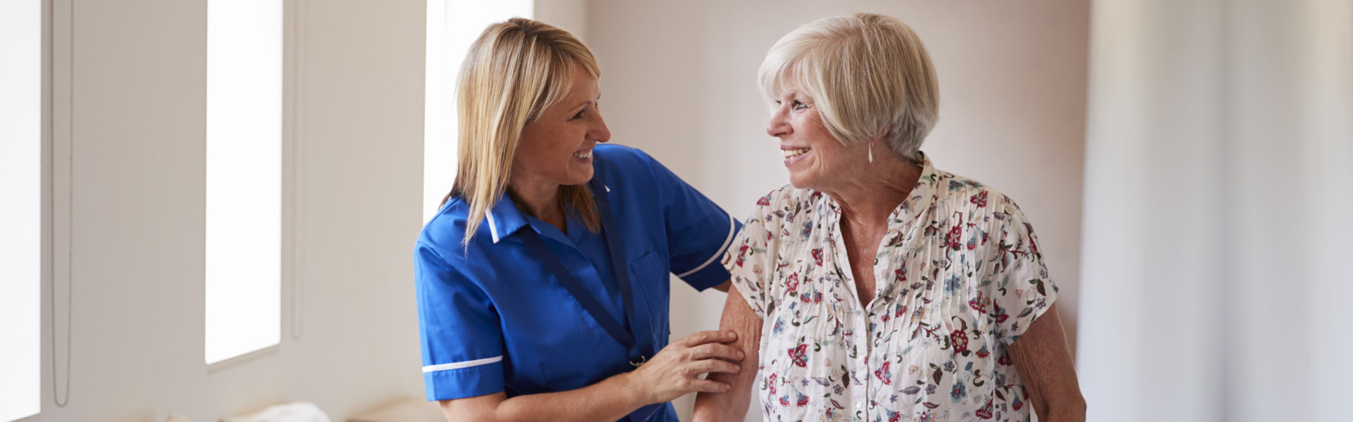 caregiver assisting senior