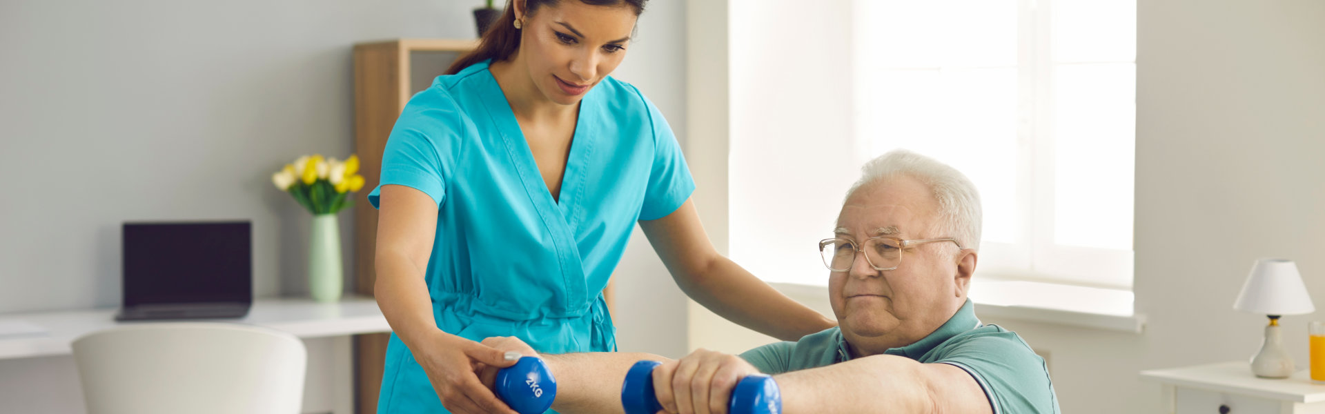 caregiver assisting senior on his exercise