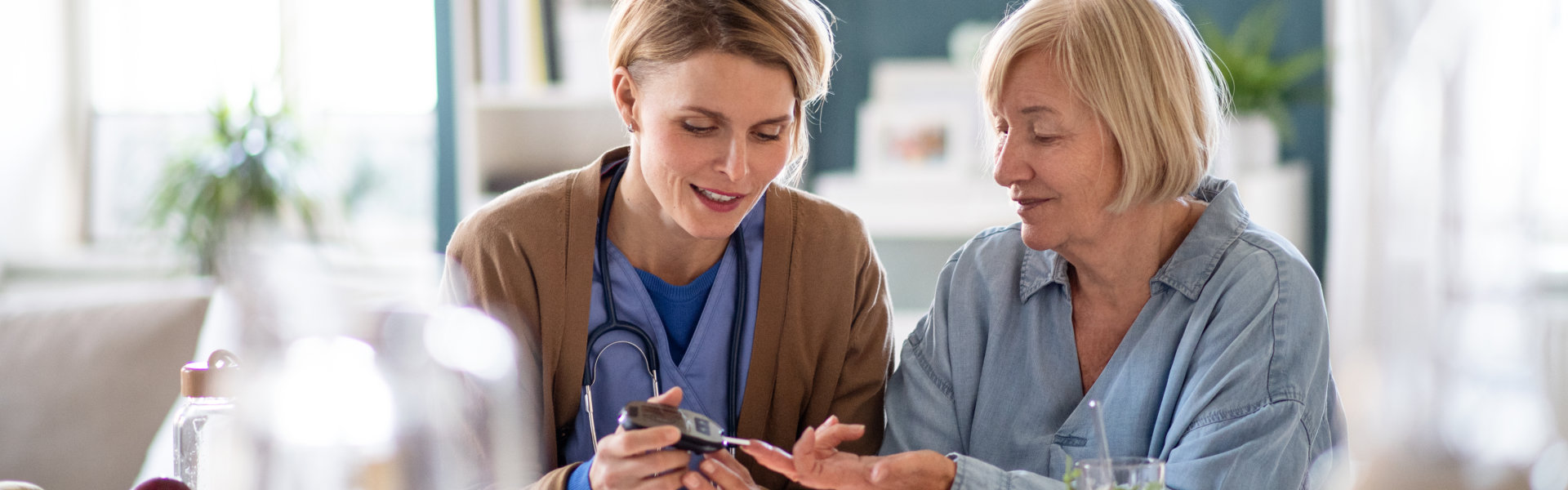 nurse doing check up on a senior