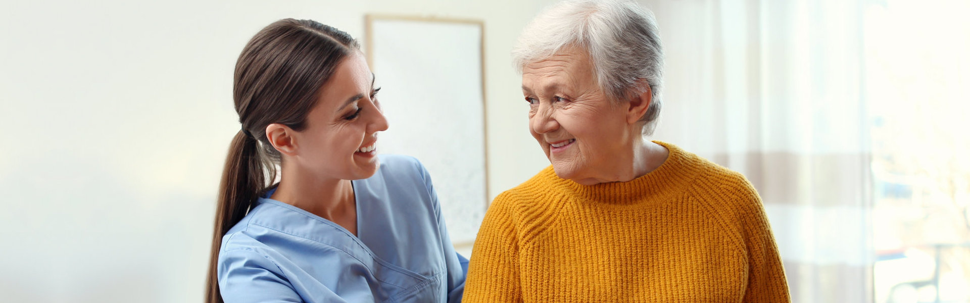 caregiver assisting senior